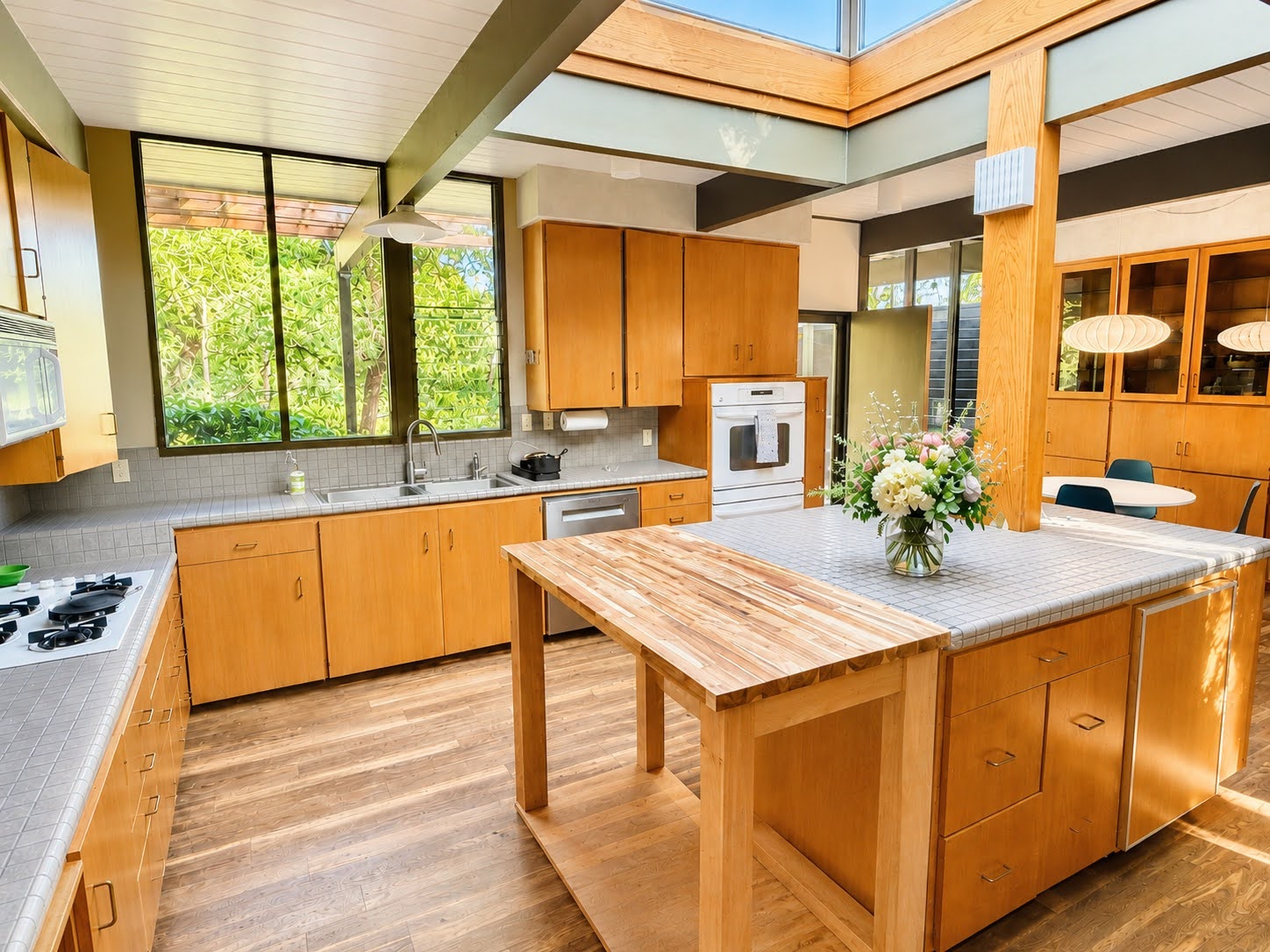 Kitchen island beneath a skylight