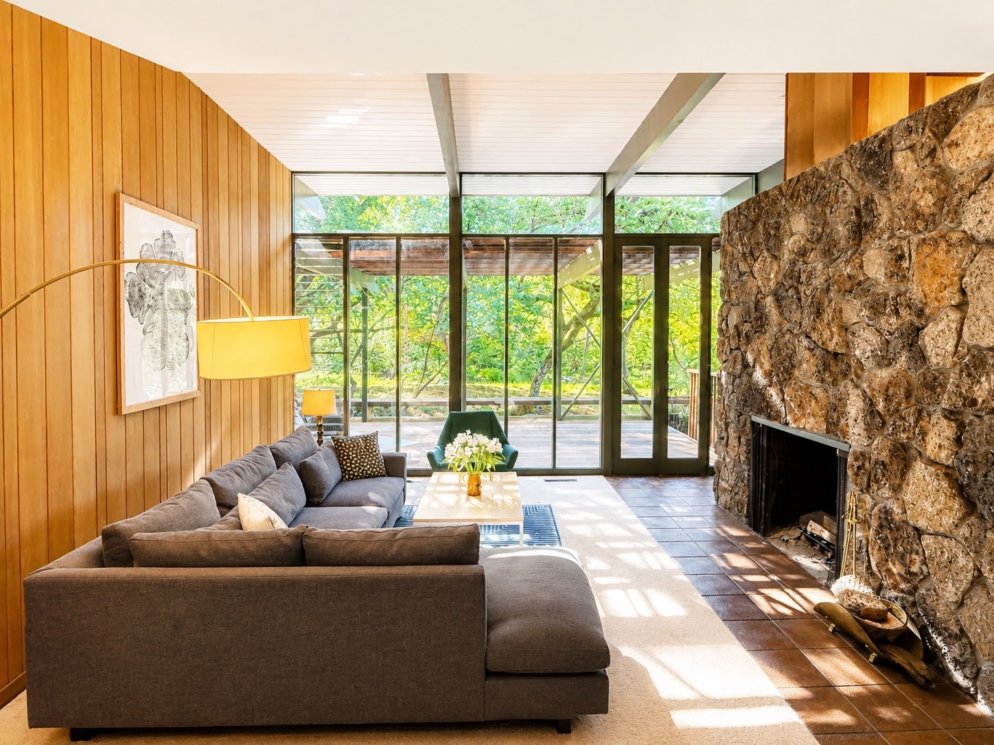 Living room with the original stone fireplace