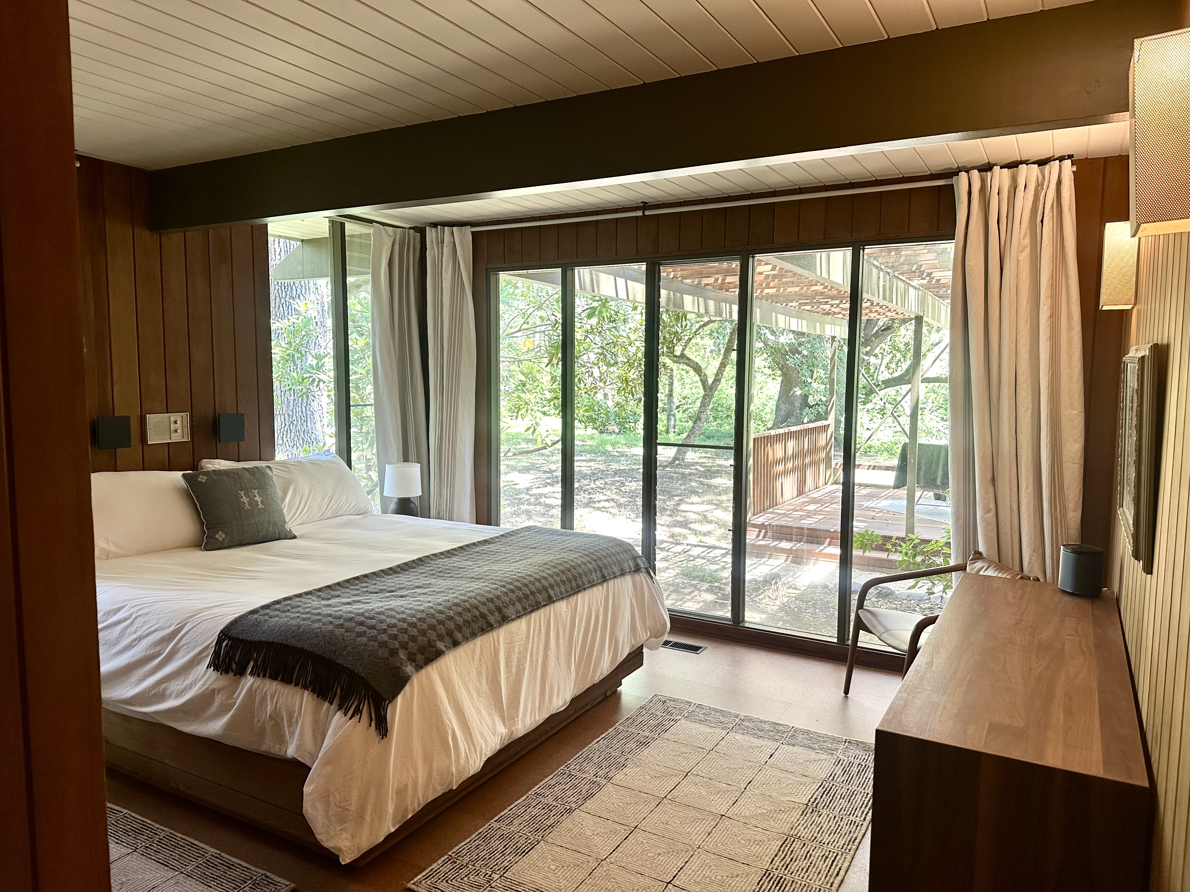 Primary bedroom with king bed and deck access